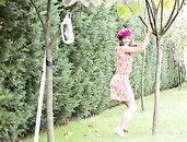 Panty And Ass Flashing Teen Cutie In The Garden
