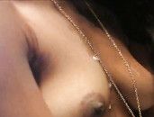 Cumshot On A Pair Of Sexy Little Amateur Black Tits